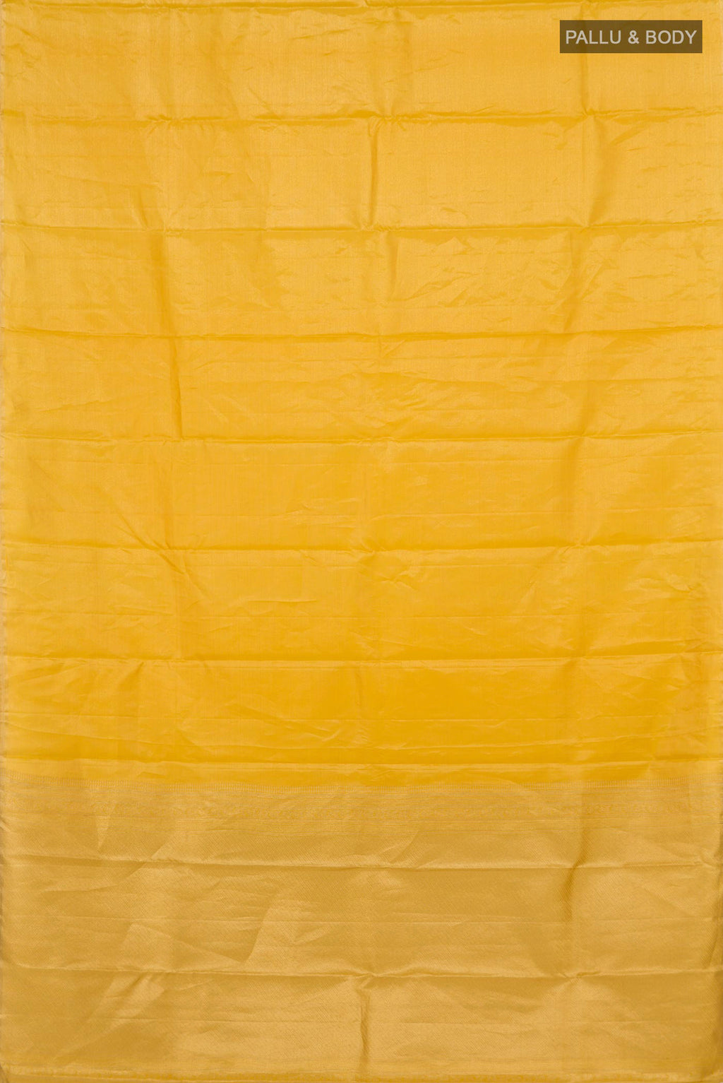 Flat view of Yellow Soft Silk Saree with Plain Body and Zari Border. 