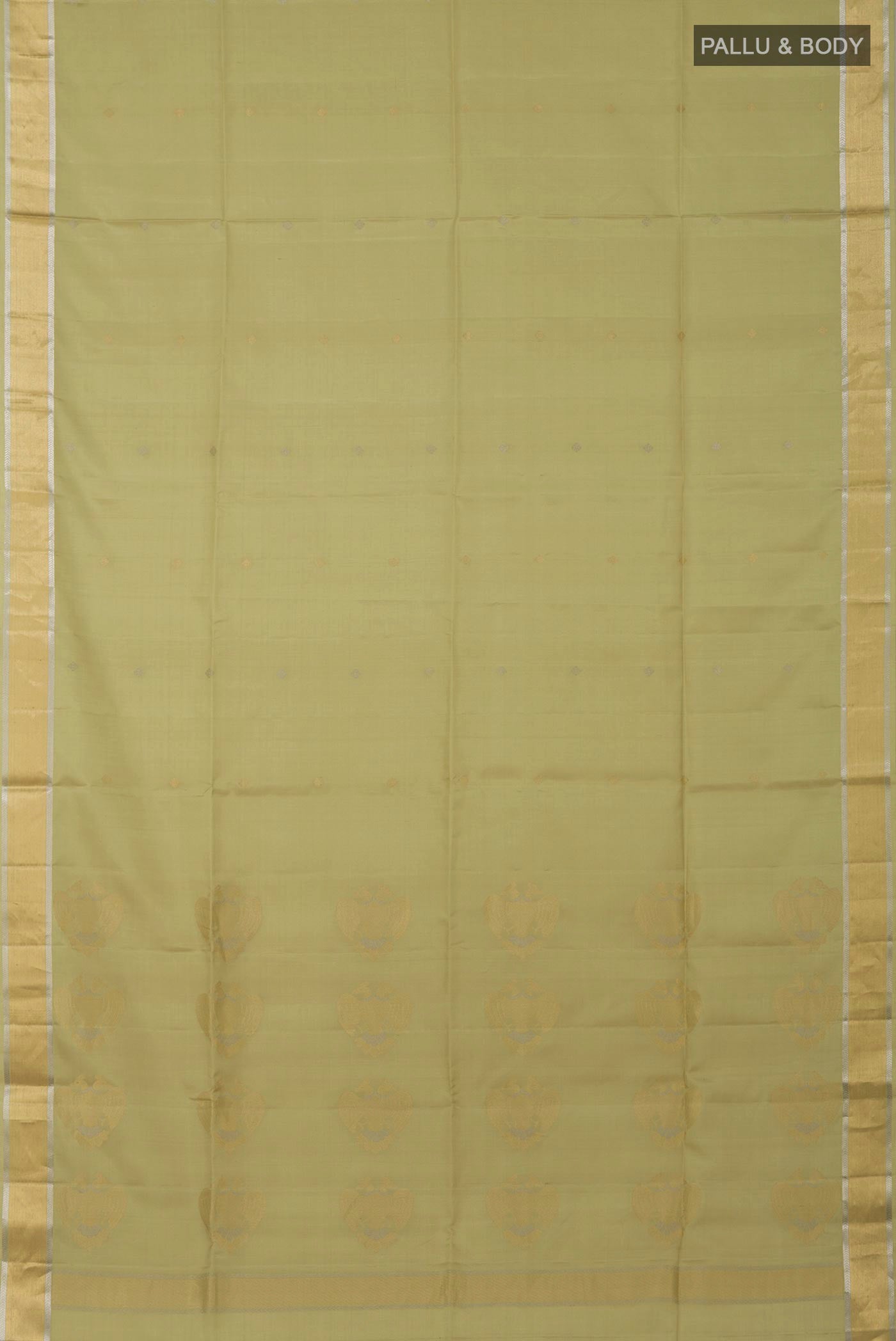 Flat view of Beige Soft Silk Saree with Zari Butta on the body and Zari Border. 