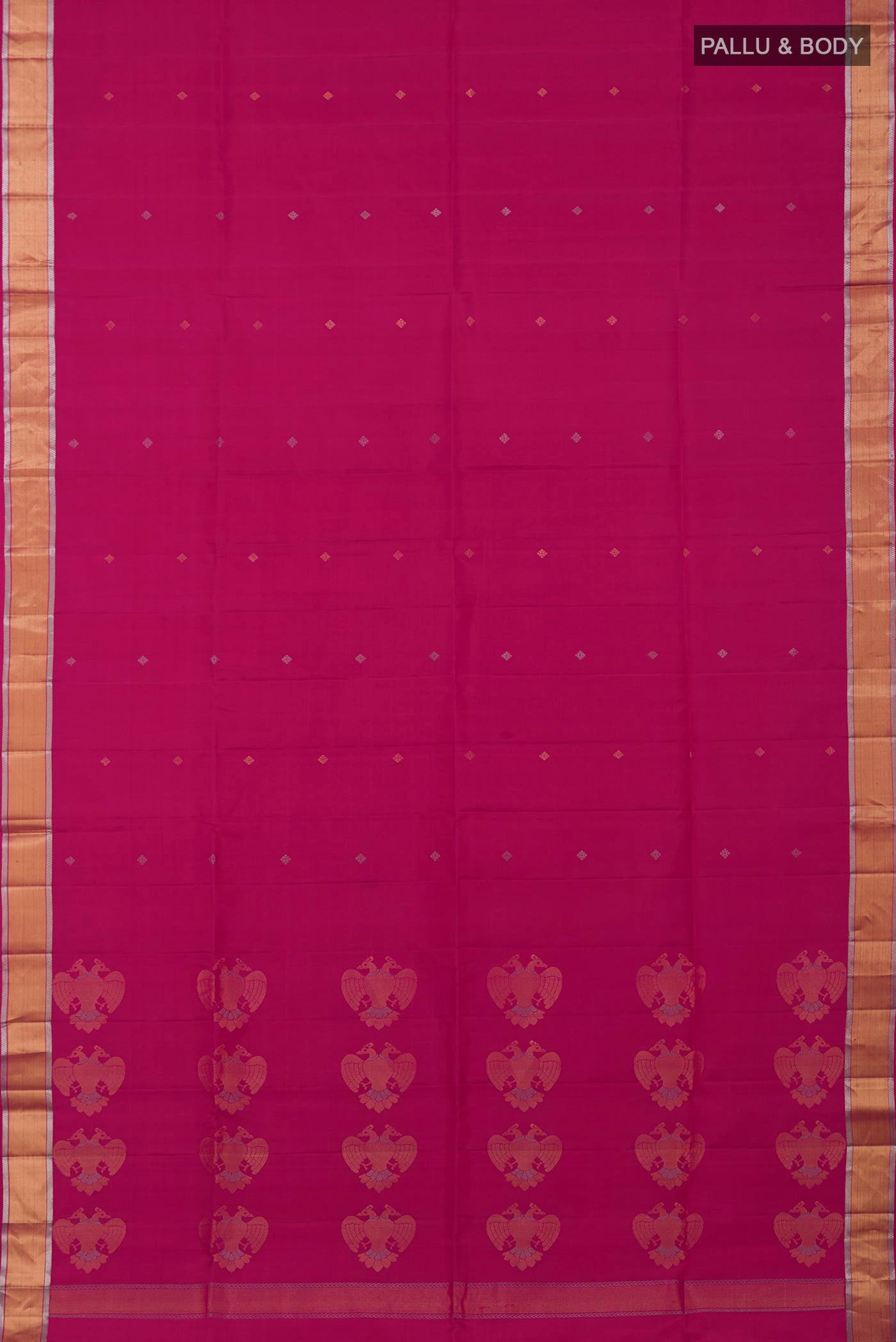 Flat view of Rani Pink Soft Silk Saree with Zari Butta on the body and Zari Border. 