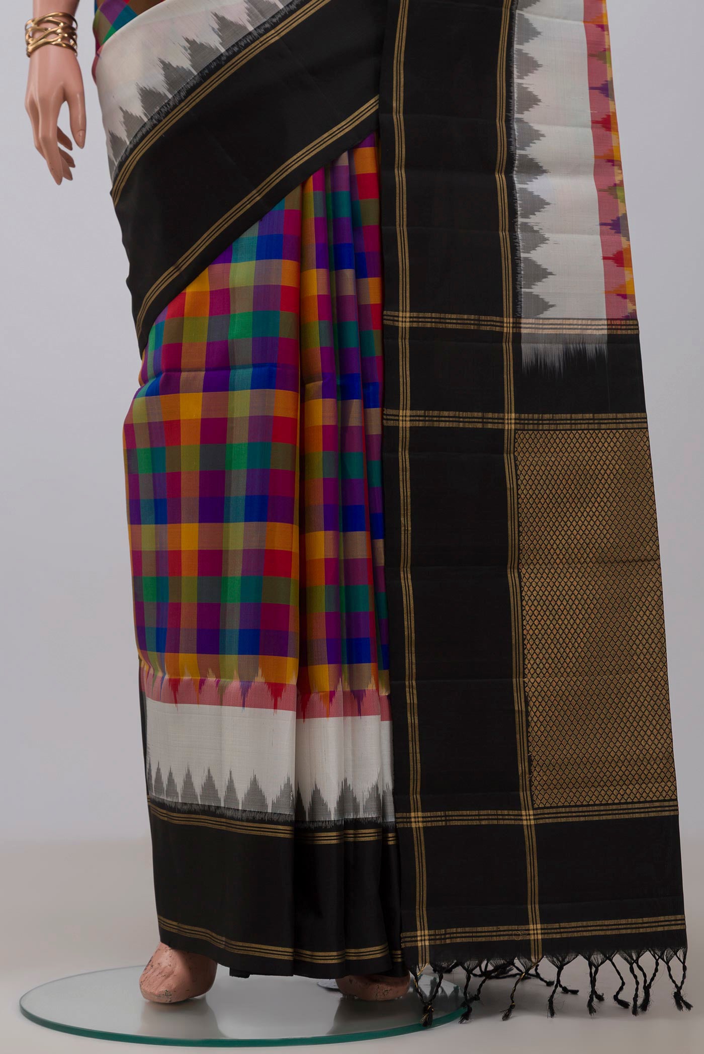 Pleats and pallu of Multi Color Soft Silk Saree with Checked design on the body and Plain Border. 