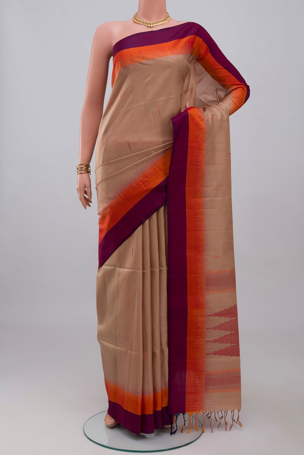 Brown Soft Silk Saree with Thread Butta on the body and Plain Border.  displayed on a mannequin