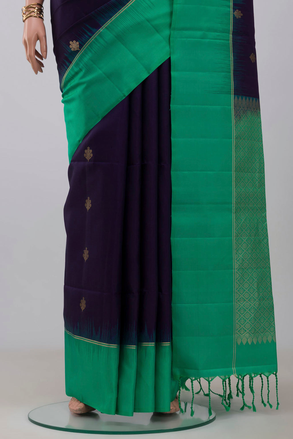 Pleats and pallu of Blue Soft Silk Saree with Zari Butta on the body and Thin Zari Line. 