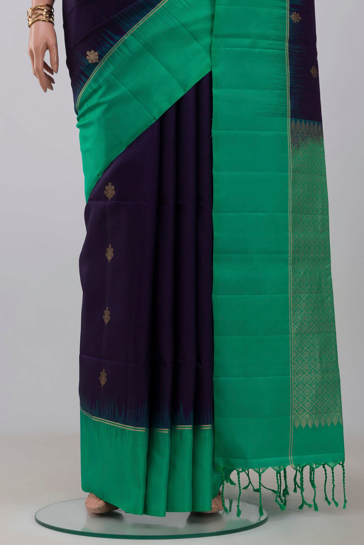 Pleats and pallu of Blue Soft Silk Saree with Zari Butta on the body and Thin Zari Line. 