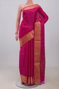 Pink Soft Silk Saree with Zari Butta on the body and Zari Border.  displayed on a mannequin