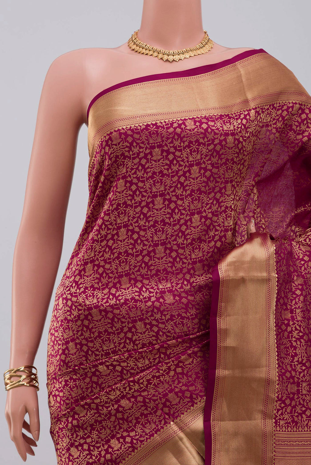 Border image of Magenta Soft Silk Saree with Zari Brocade on the body and Zari Border. 