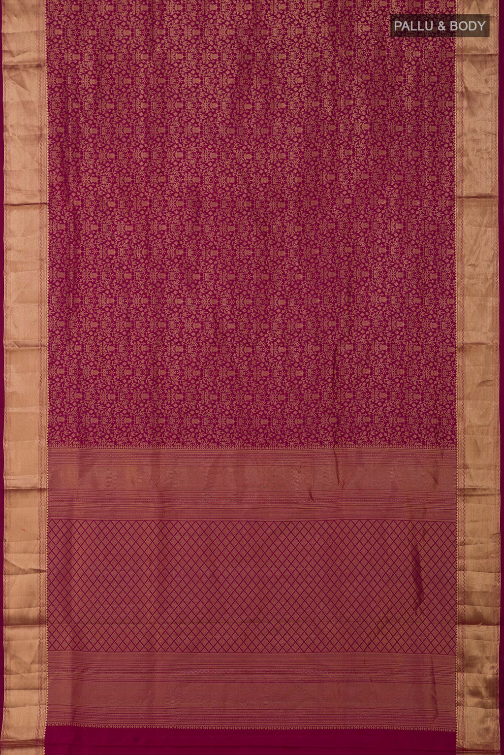 Flat view of Magenta Soft Silk Saree with Zari Brocade on the body and Zari Border. 
