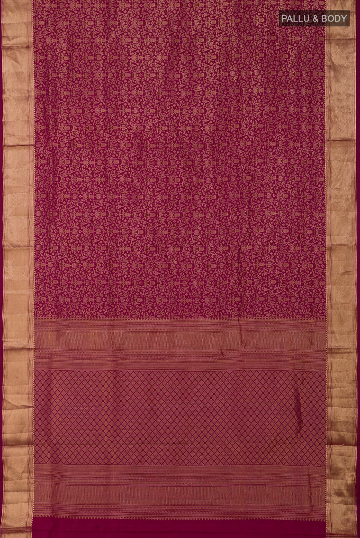 Flat view of Magenta Soft Silk Saree with Zari Brocade on the body and Zari Border. 