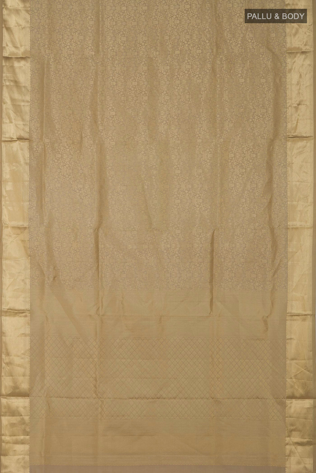Flat view of Beige Soft Silk Saree with Zari Brocade on the body and Zari Border. 