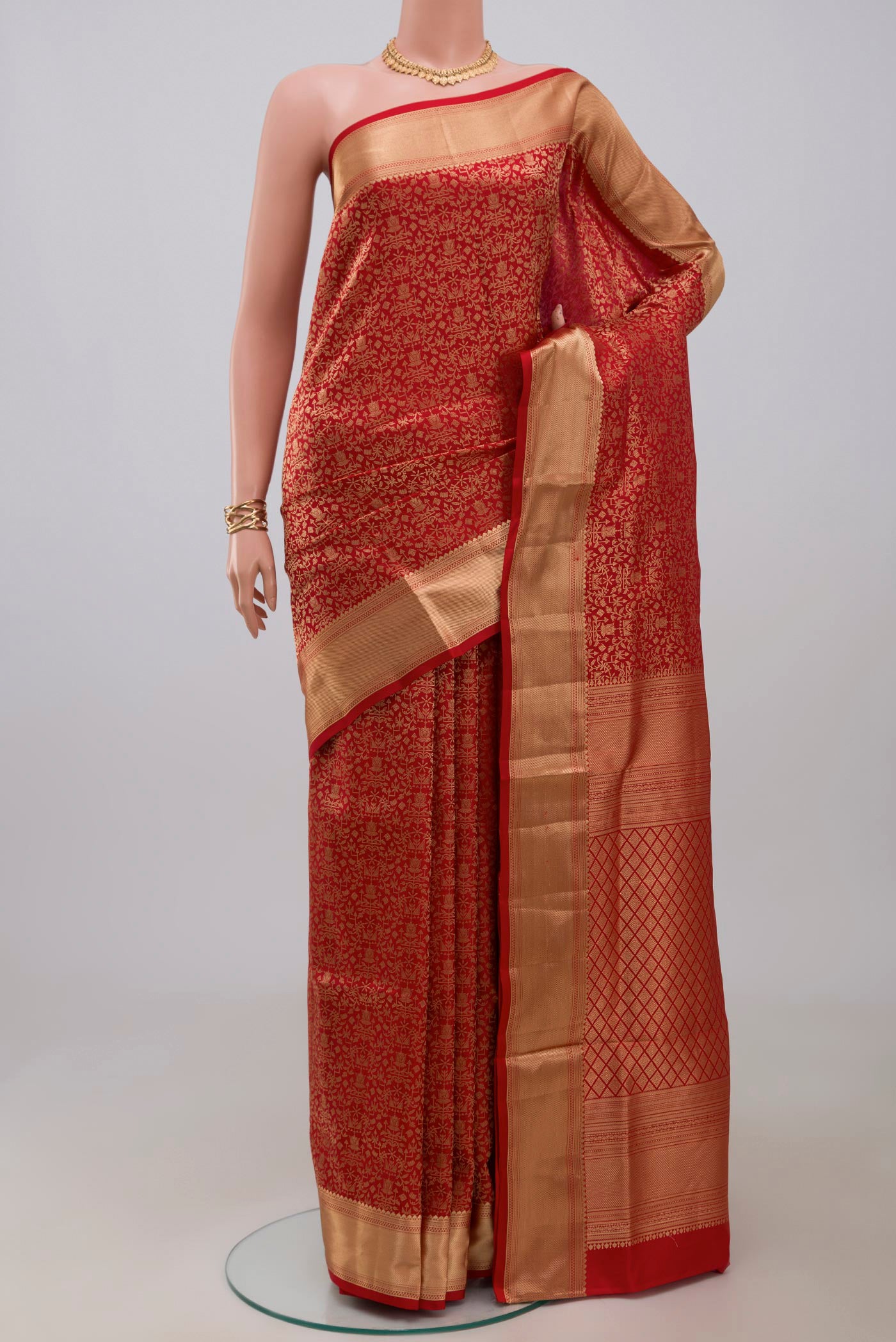 Red Soft Silk Saree with Zari Brocade on the body and Zari Border.  displayed on a mannequin