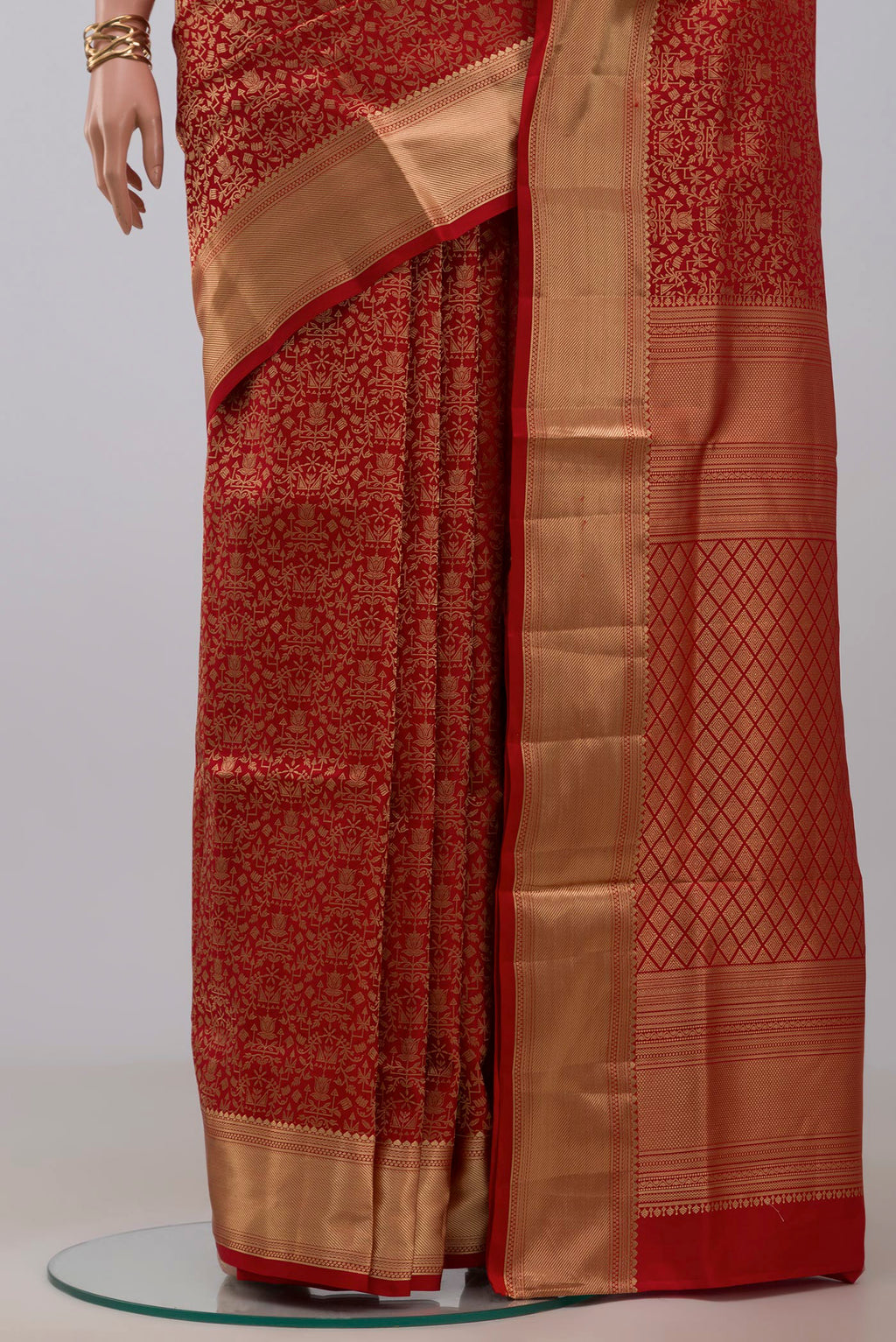 Pleats and pallu of Red Soft Silk Saree with Zari Brocade on the body and Zari Border. 
