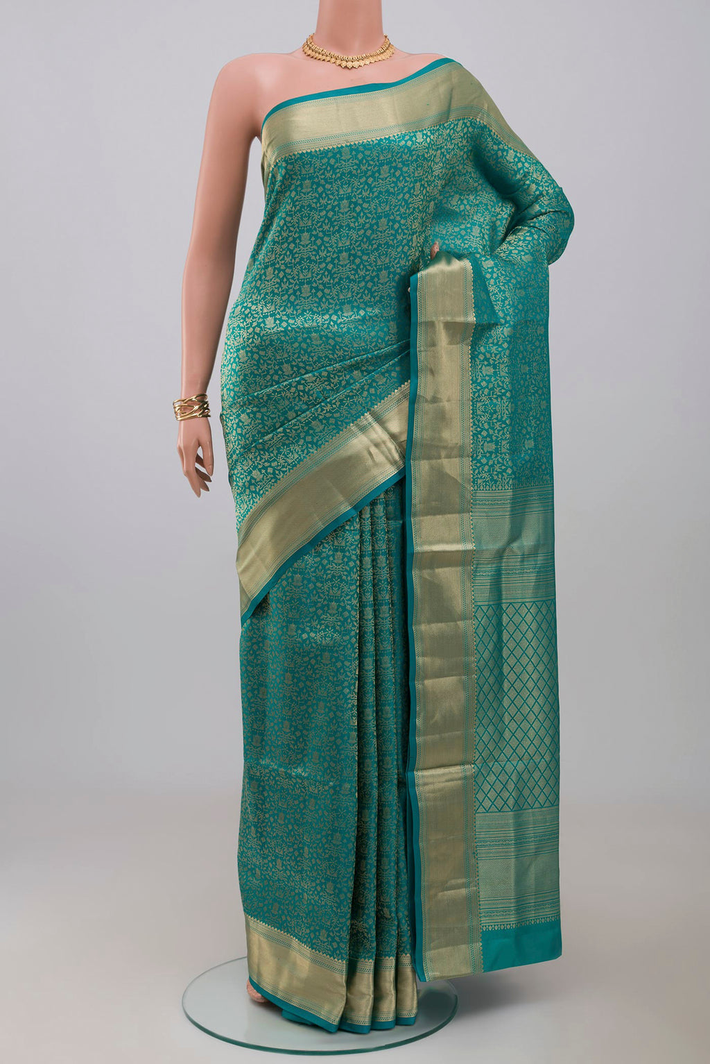 Blue Soft Silk Saree with Zari Brocade on the body and Zari Border.  displayed on a mannequin