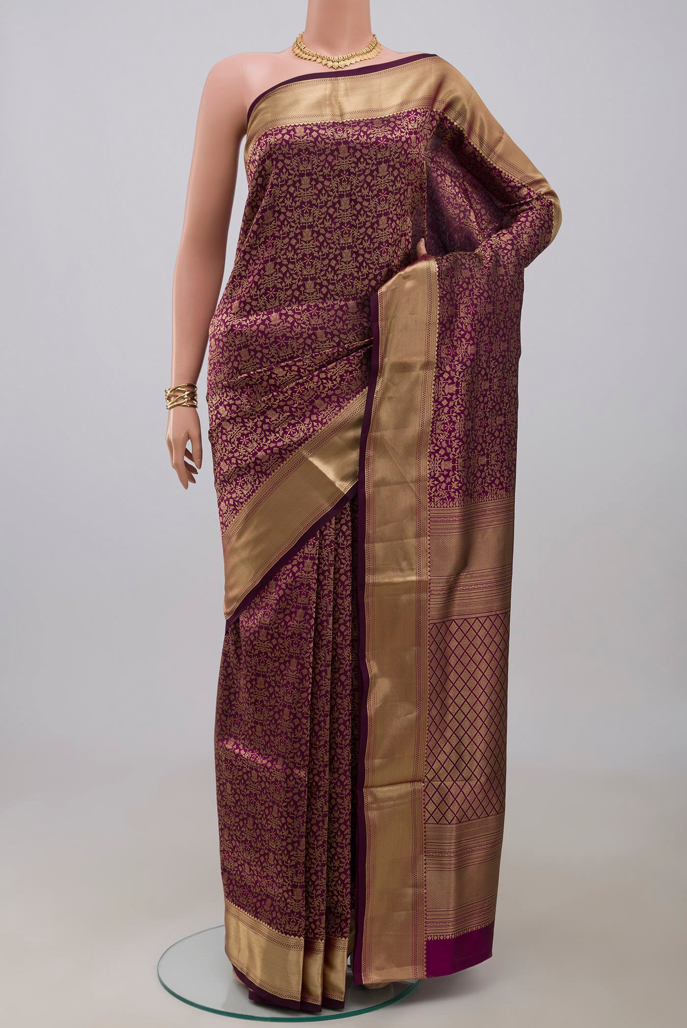 Purple Soft Silk Saree with Zari Brocade on the body and Zari Border.  displayed on a mannequin