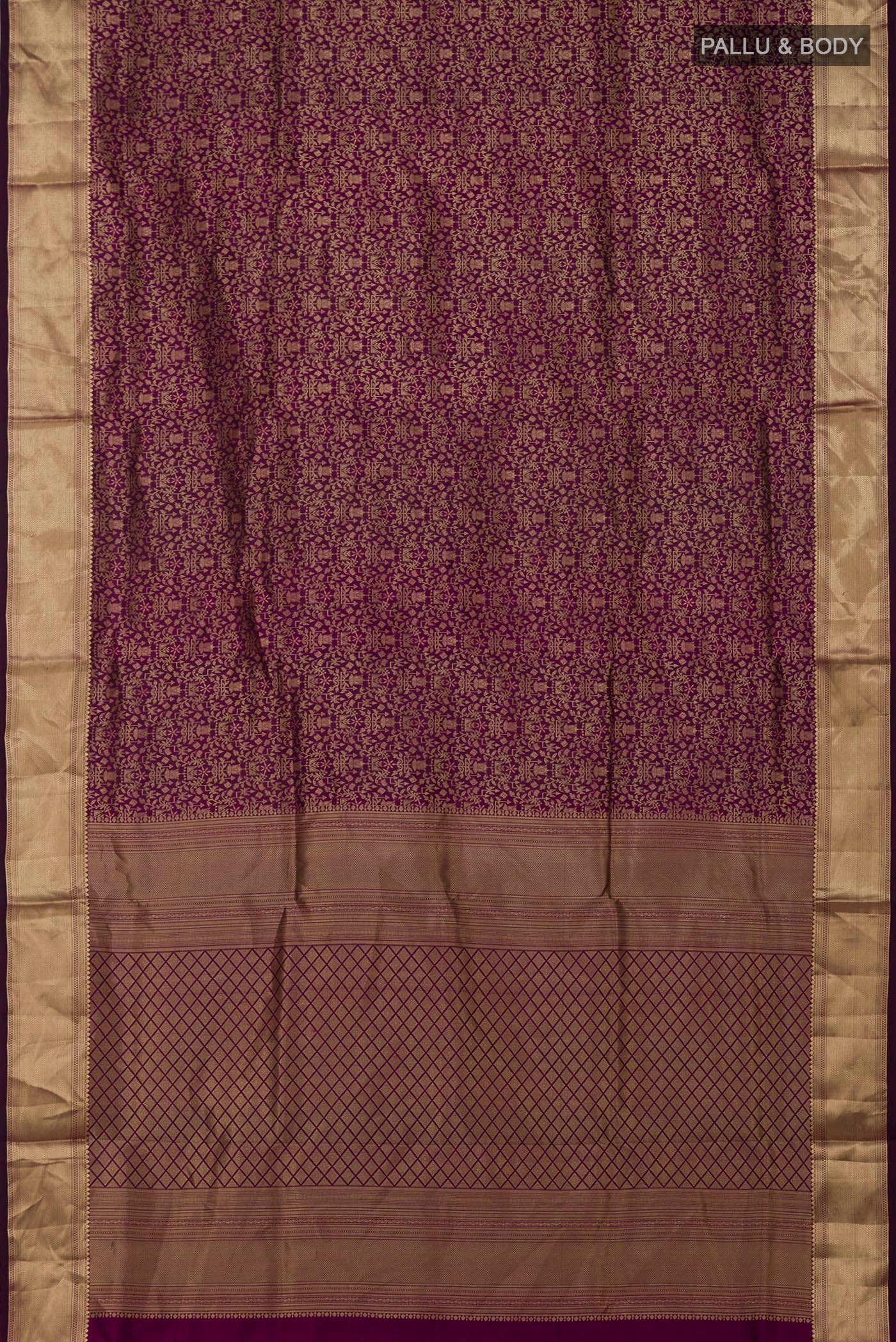 Flat view of Purple Soft Silk Saree with Zari Brocade on the body and Zari Border. 