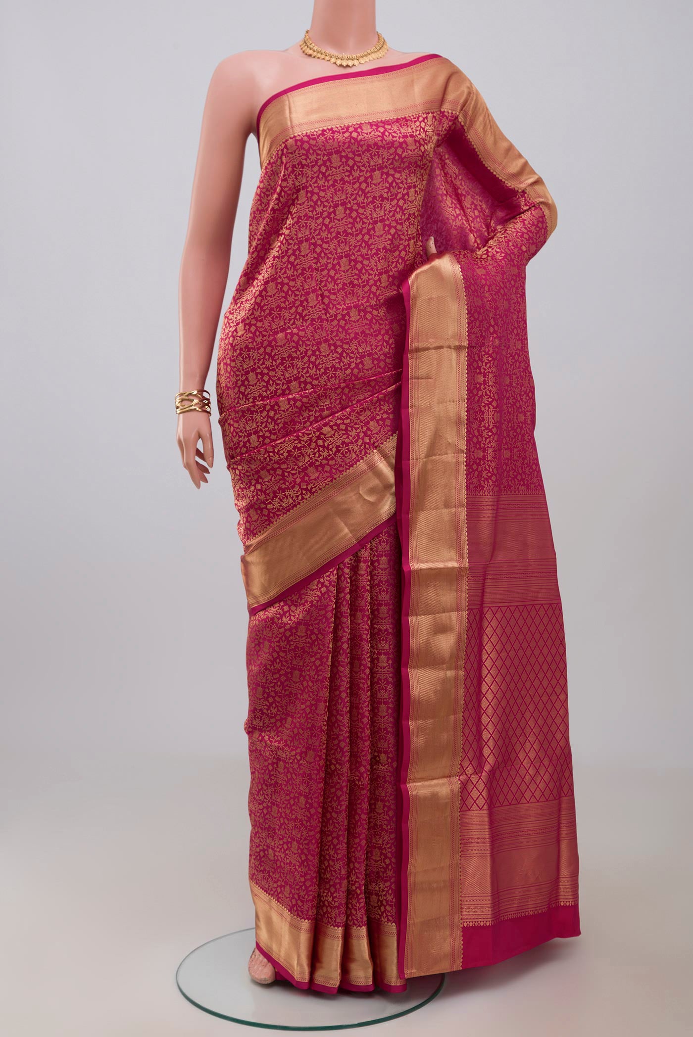 Pink Soft Silk Saree with Zari Brocade on the body and Zari Border.  displayed on a mannequin