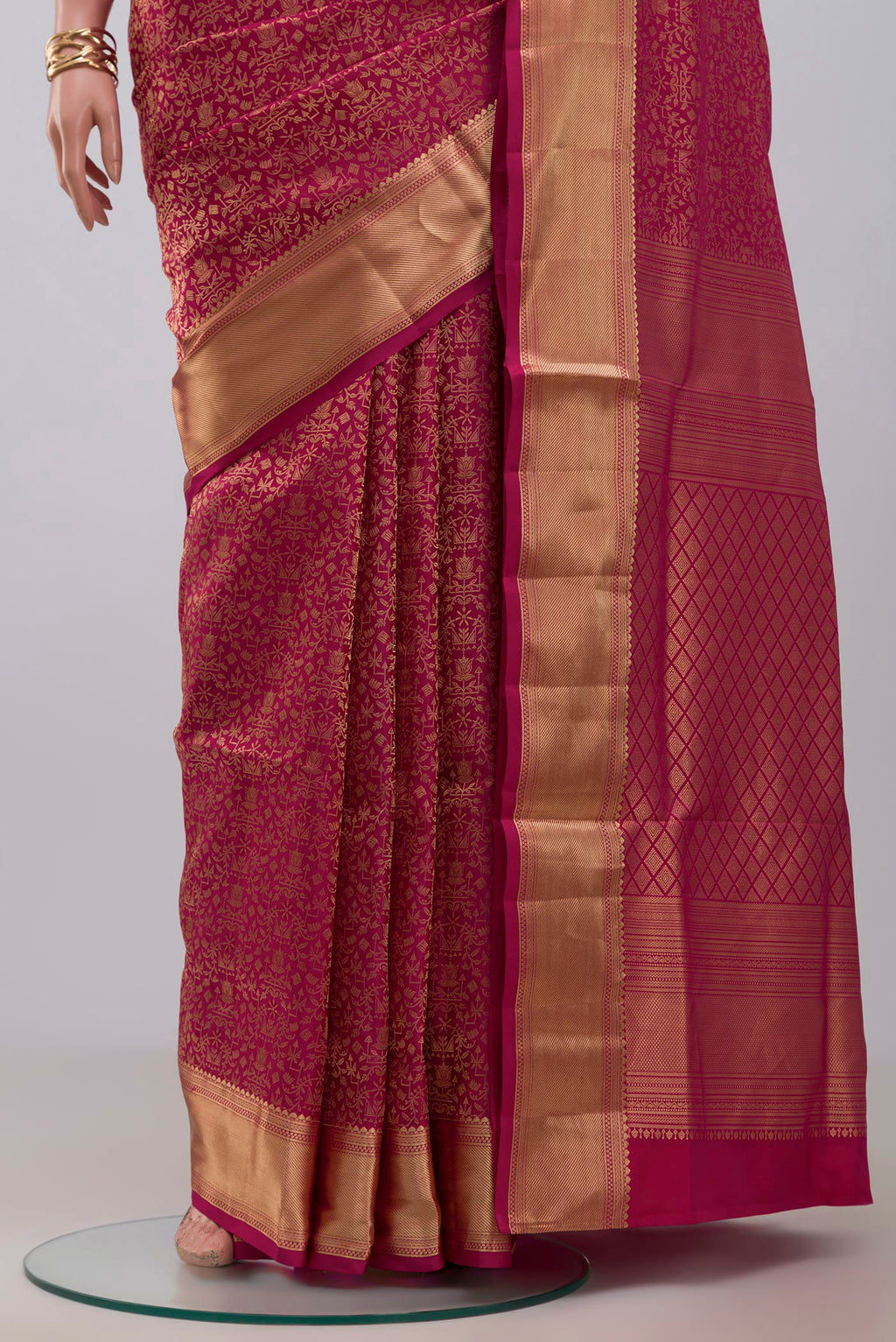 Pleats and pallu of Pink Soft Silk Saree with Zari Brocade on the body and Zari Border. 