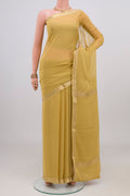 Sandal Mysore Georgette Saree with Plain Body and Zari Border.  displayed on a mannequin