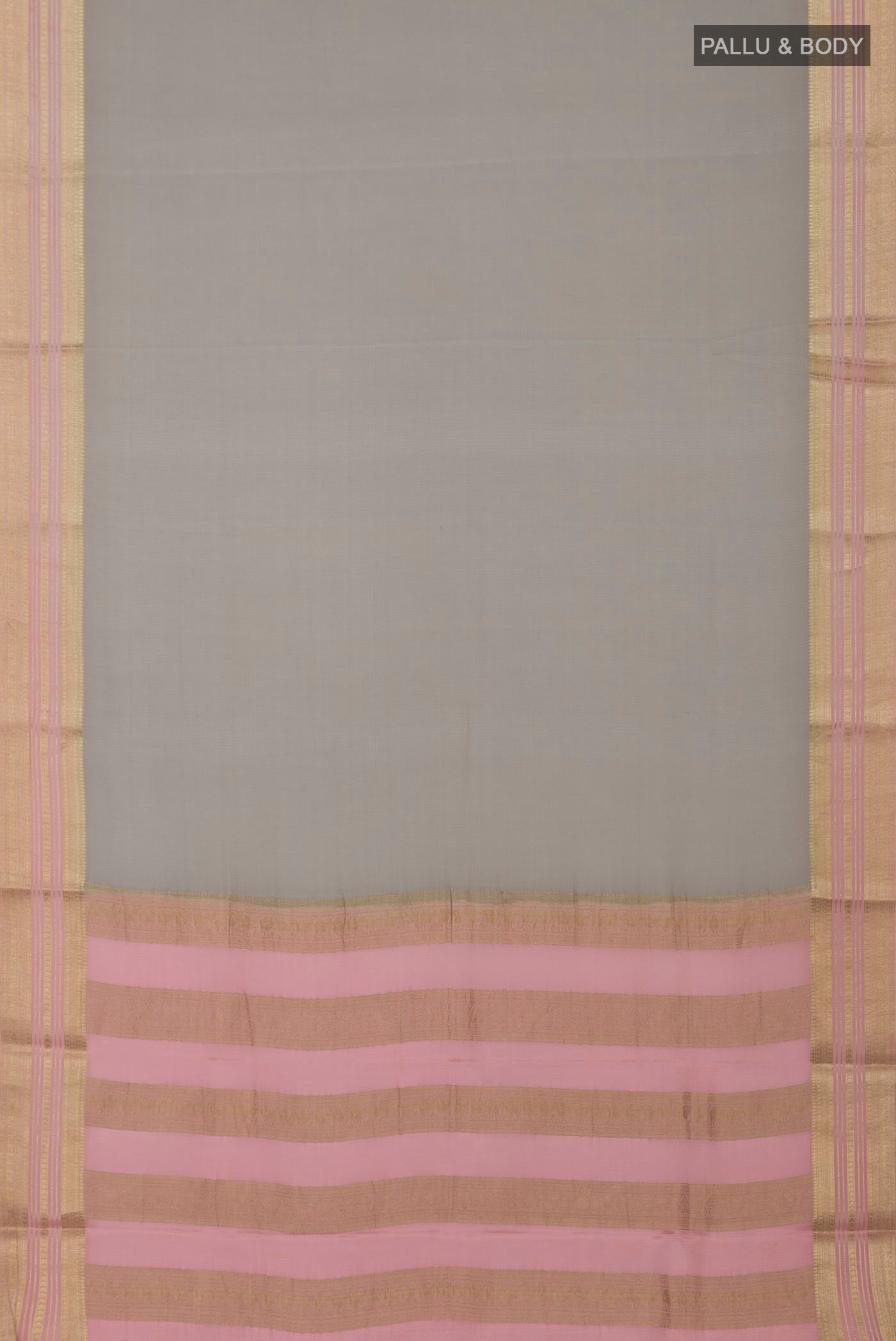 Flat view of Grey Crepe Saree with Plain Body and Fancy Border. 