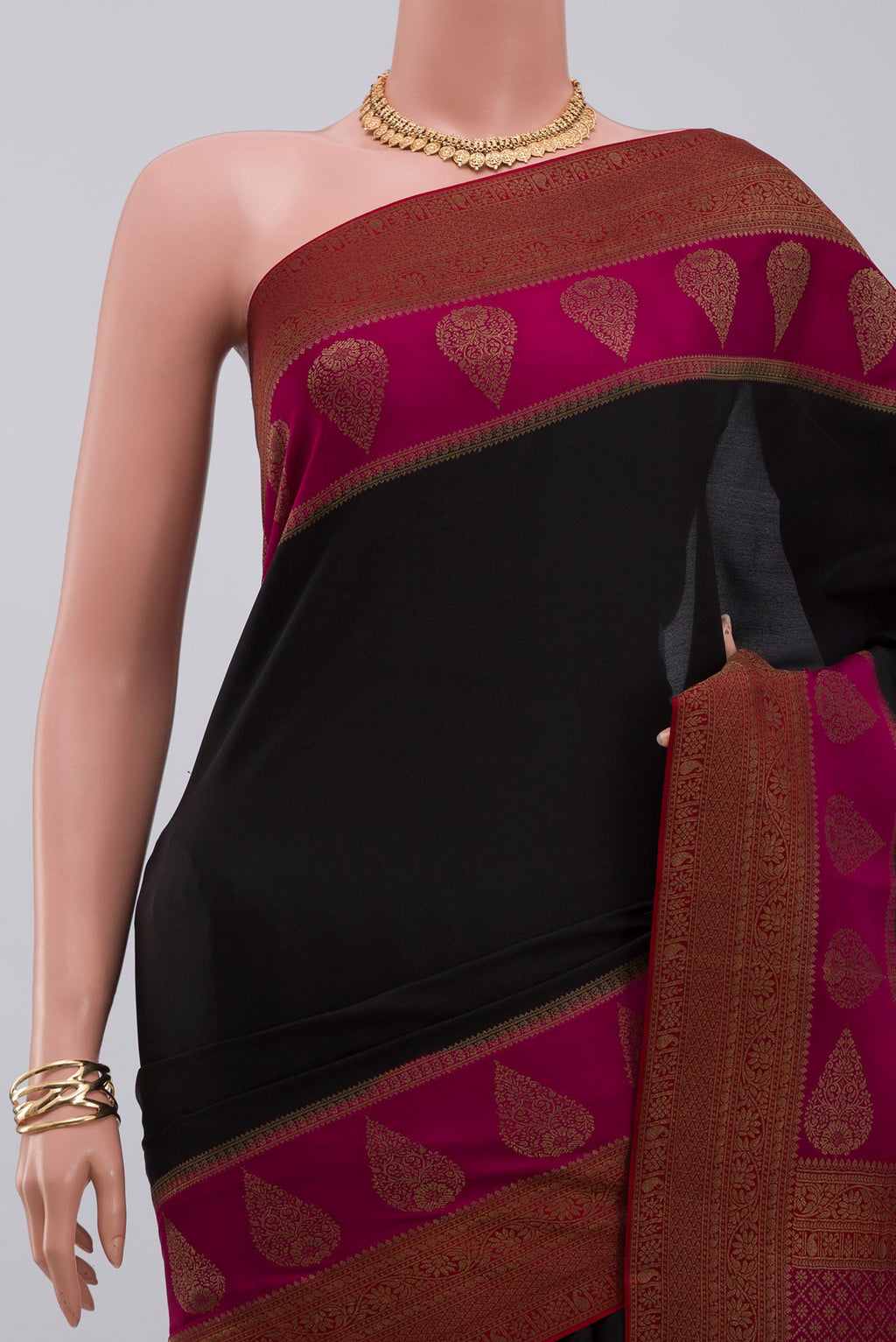 Border image of Black Crepe Saree with Plain Body and Zari Border. 