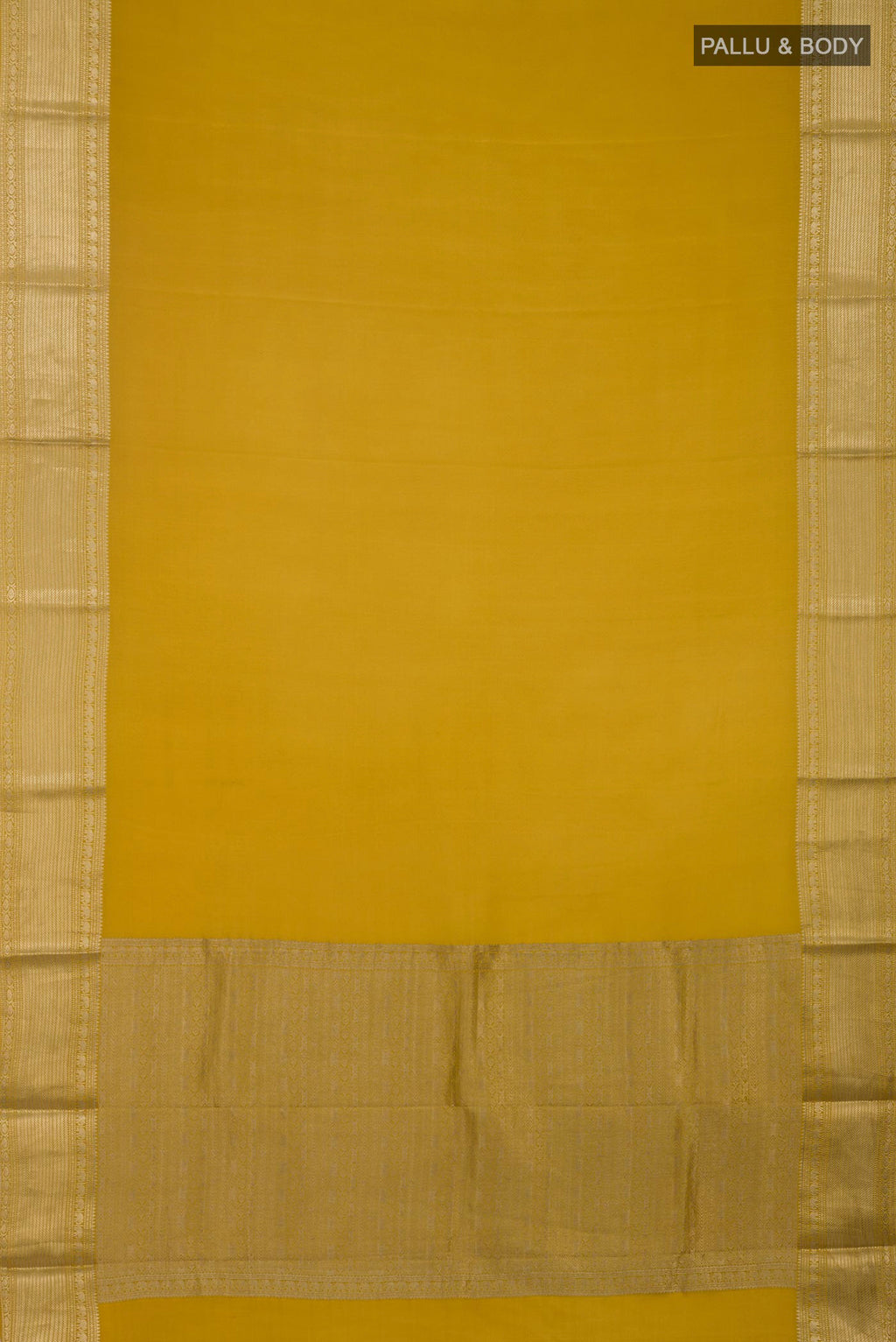 Flat view of Yellow Mysore Crepe Saree with Plain Body and Zari Border. 