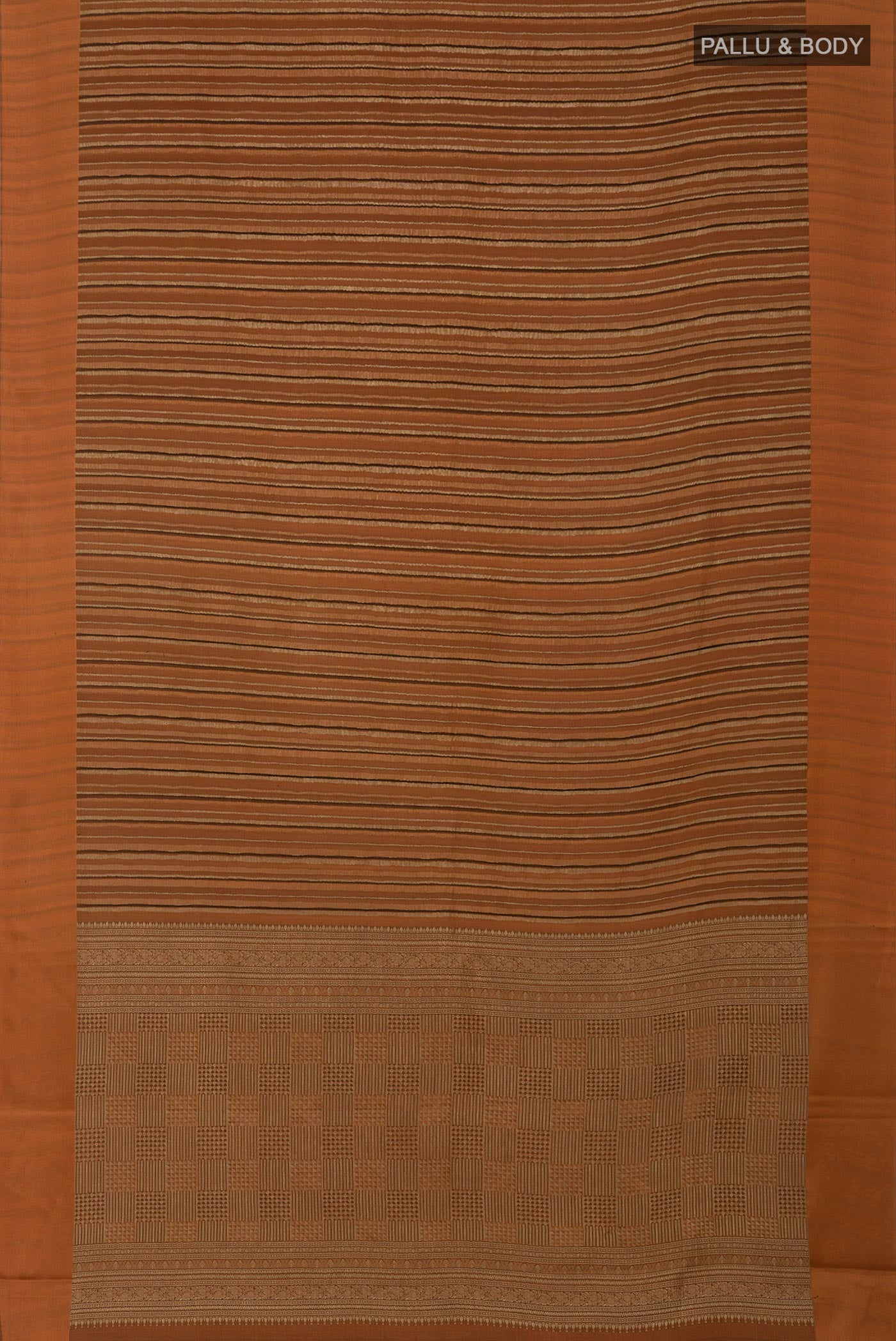 Flat view of Rust Mysore Crepe Saree with Stripes on the body and Plain Border. 