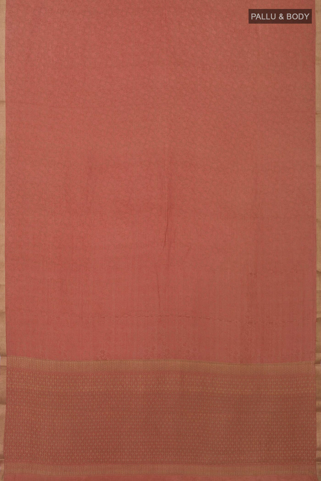 Flat view of Peach Crepe Saree with Fancy on the body and Zari Border. 