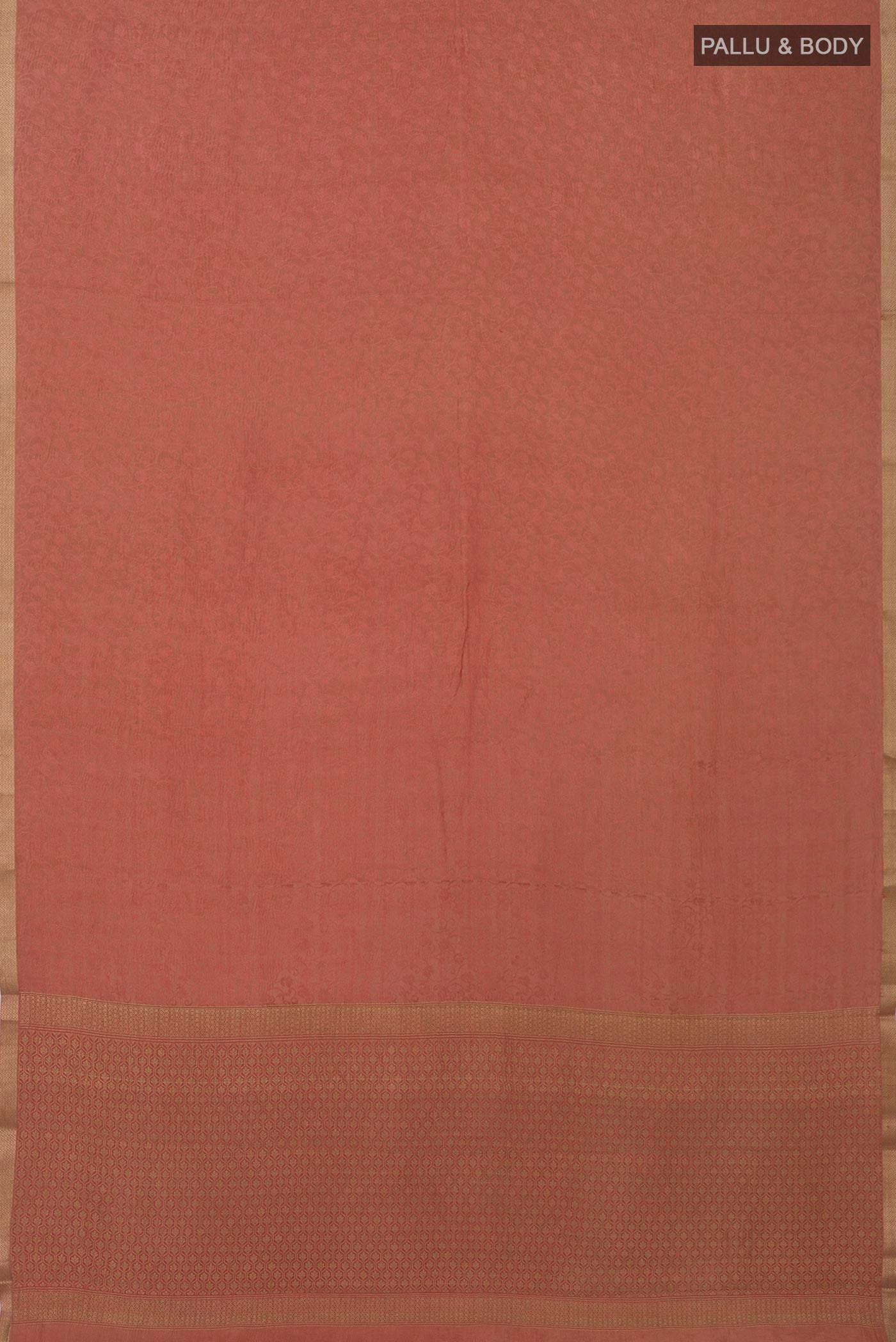 Flat view of Peach Crepe Saree with Fancy on the body and Zari Border. 