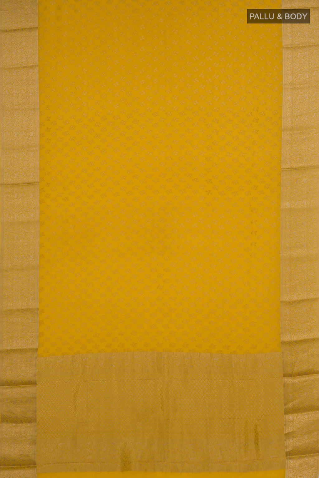 Flat view of Yellow Mysore Crepe Saree with Zari Butta on the body and Zari Border. 