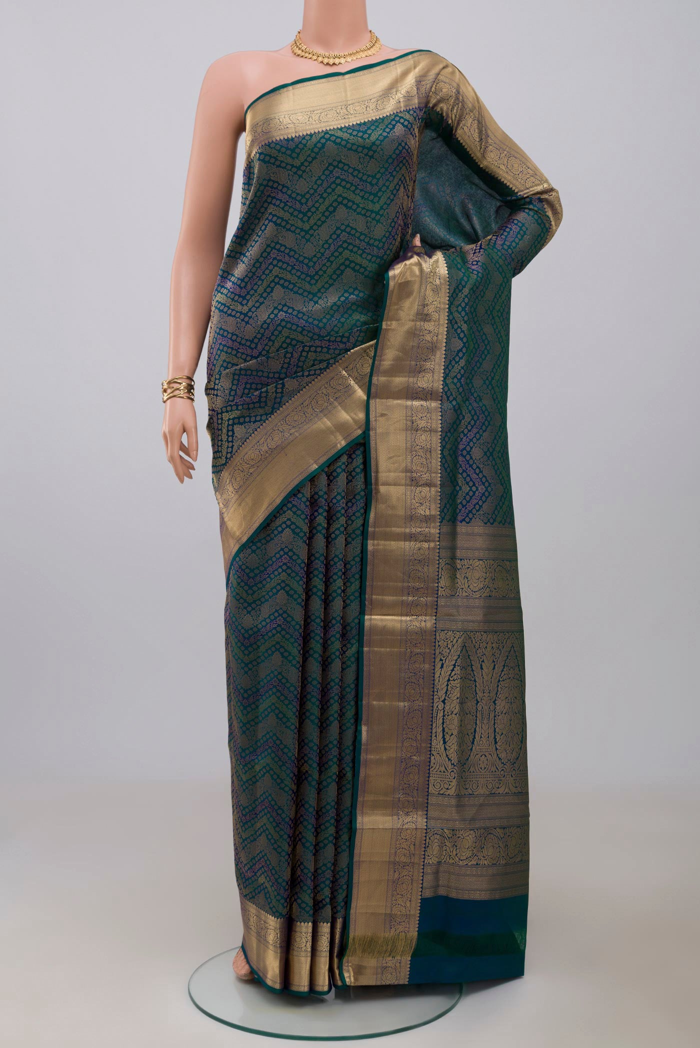 Peacock Blue Dual Tone Soft Silk Saree with Zari Brocade on the body and Zari Border.  displayed on a mannequin