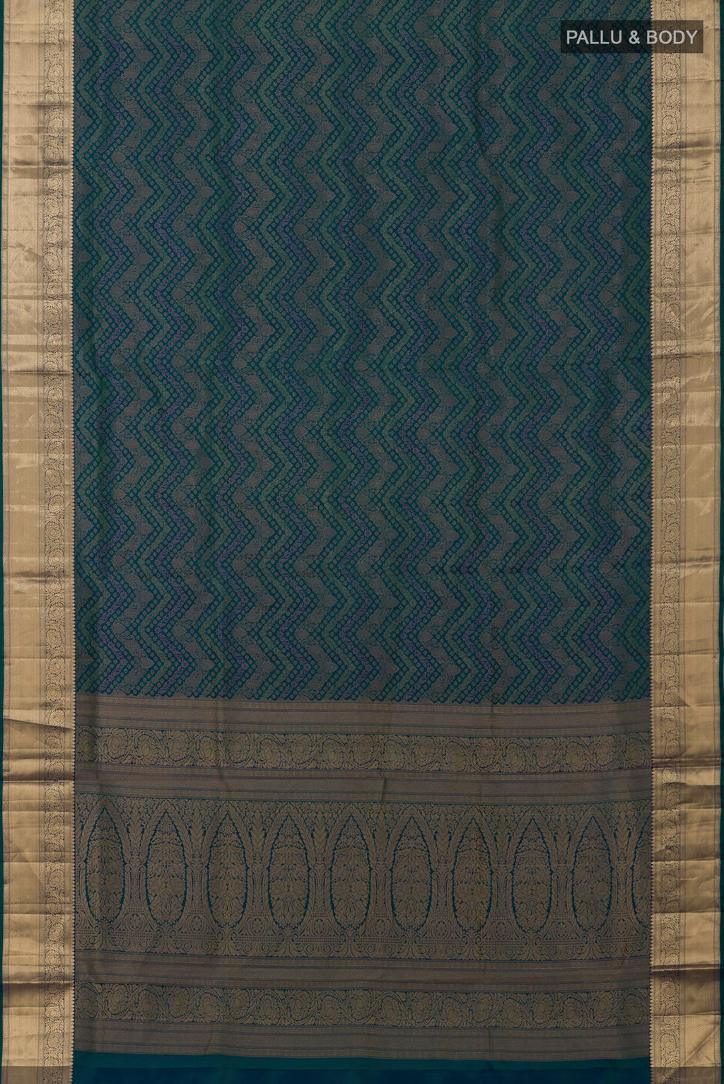 Flat view of Peacock Blue Dual Tone Soft Silk Saree with Zari Brocade on the body and Zari Border. 