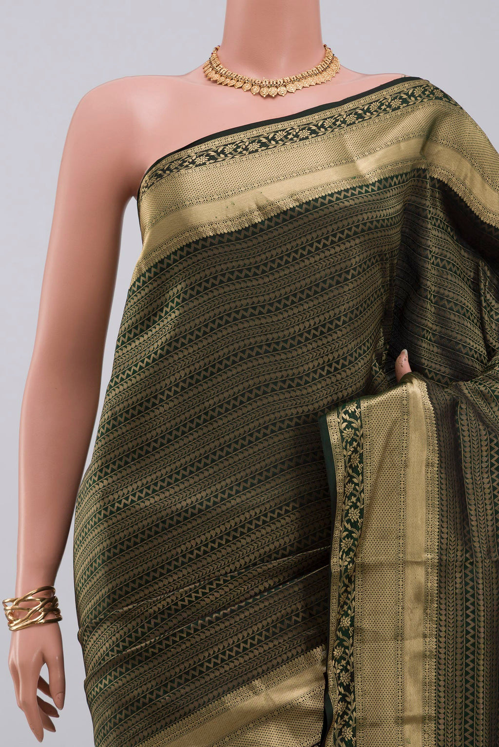 Border image of Green Soft Silk Saree with Zari Brocade on the body and Zari Border. 