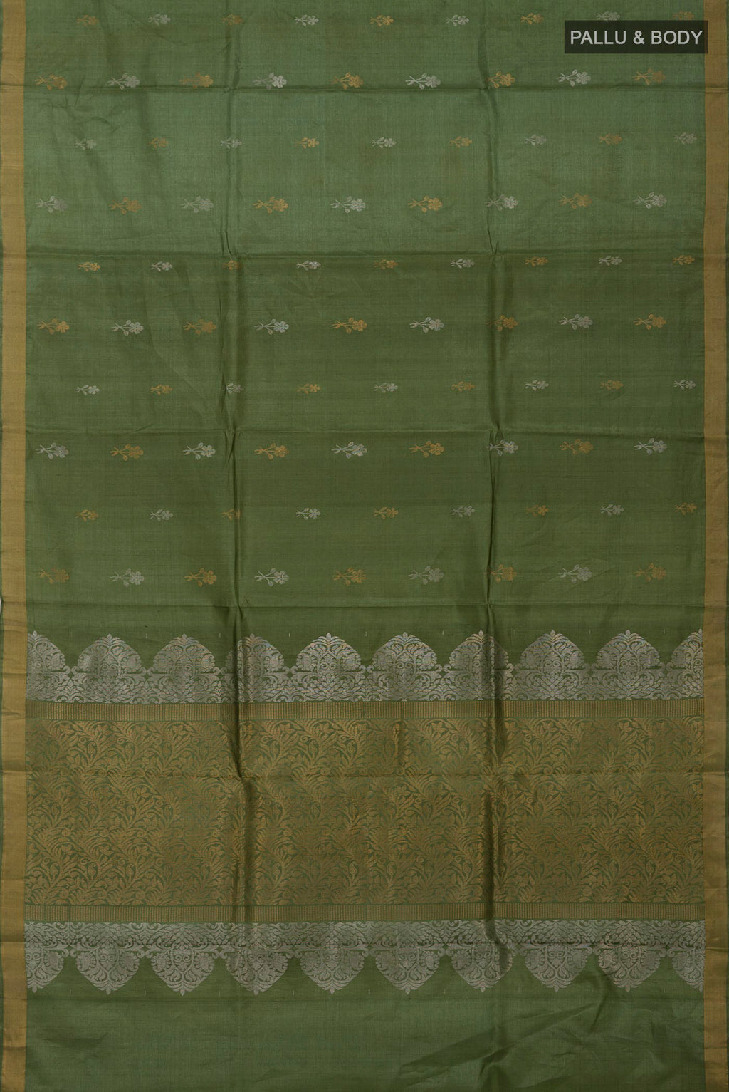 Flat view of Sage Green Tussar Silk Saree with Zari Butta on the body and Zari Border. 