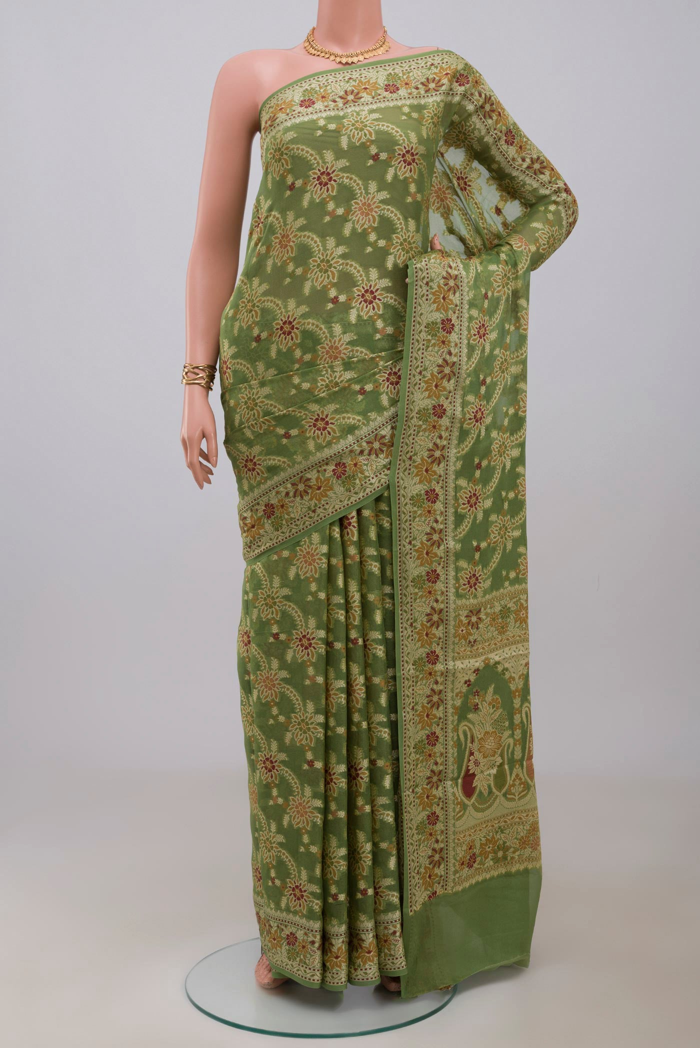 Green Banarasi Georgette Saree with Thread Brocade on the body and Thread Border.  displayed on a mannequin