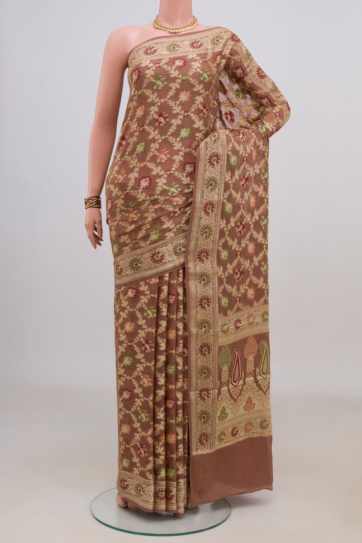 Brown Banarasi Georgette Saree with Thread Brocade on the body and Thread Border.  displayed on a mannequin