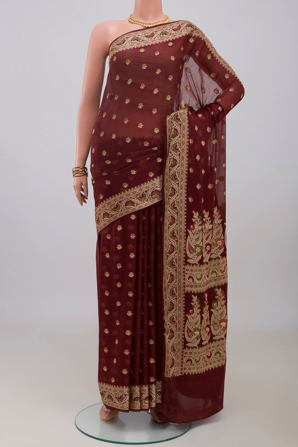 Coffee Brown Banarasi Georgette Saree with Thread Butta on the body and Thread Border.  displayed on a mannequin