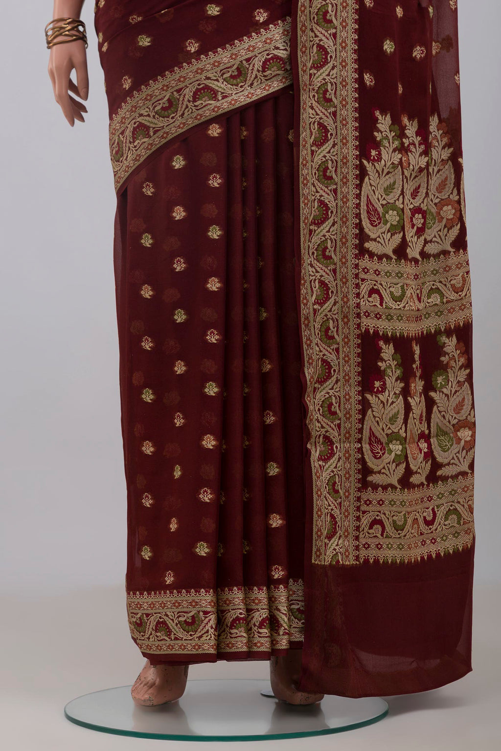 Pleats and pallu of Coffee Brown Banarasi Georgette Saree with Thread Butta on the body and Thread Border. 