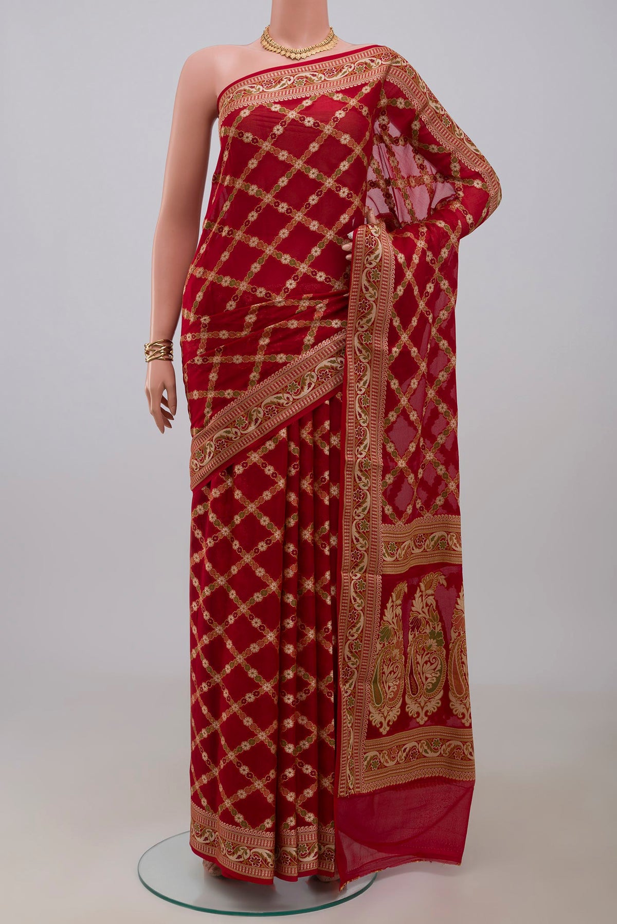 Deep Red Banarasi Georgette Saree with Thread Butta on the body and Zari And Thread Border.  displayed on a mannequin