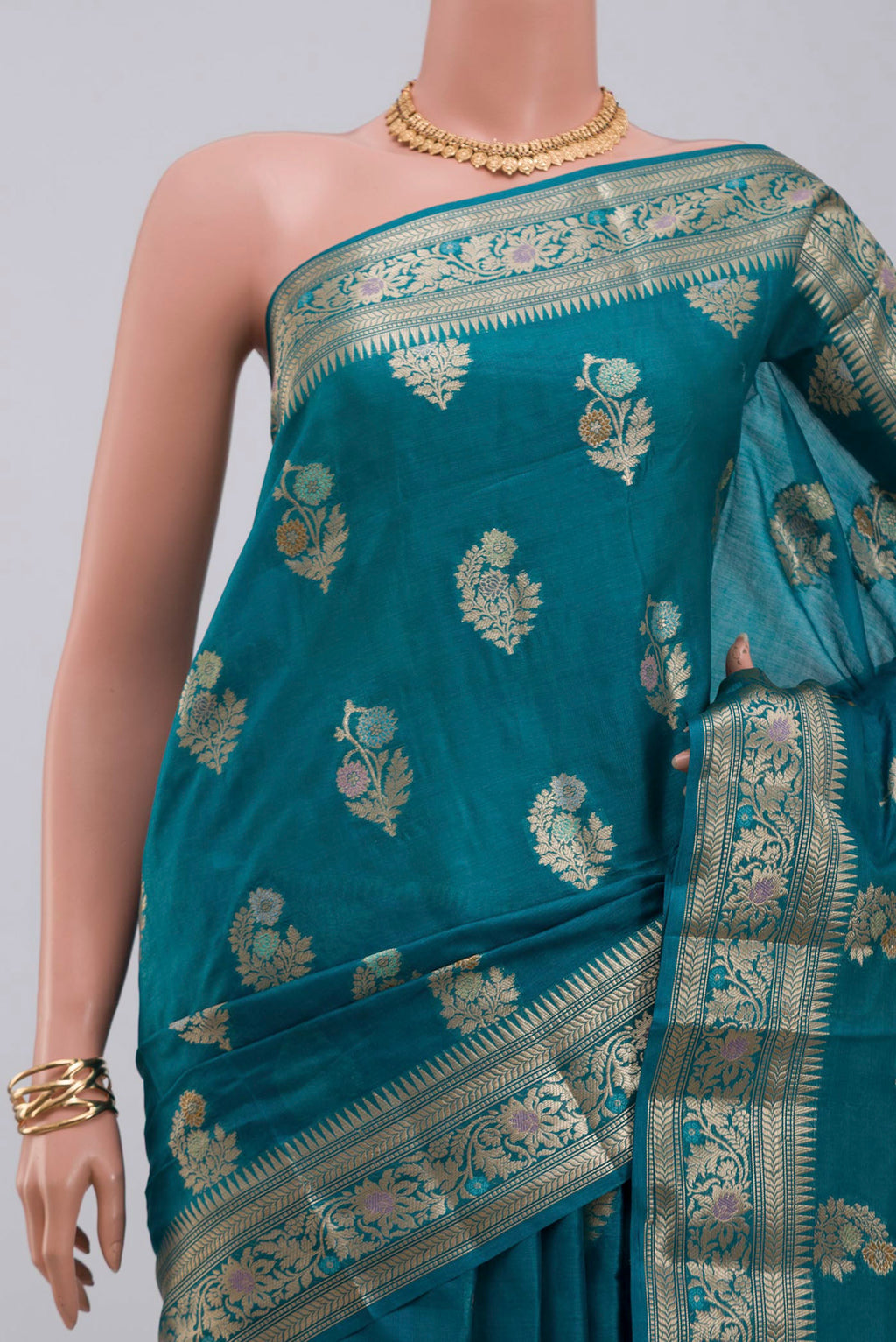 Border image of Blue Tussar Silk Saree with Zari Butta on the body and Zari Border. 