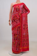 Pure Silk Red Rajkot Patola Saree with Pure Ikat on the body and Thin Zari Line.  displayed on a mannequin