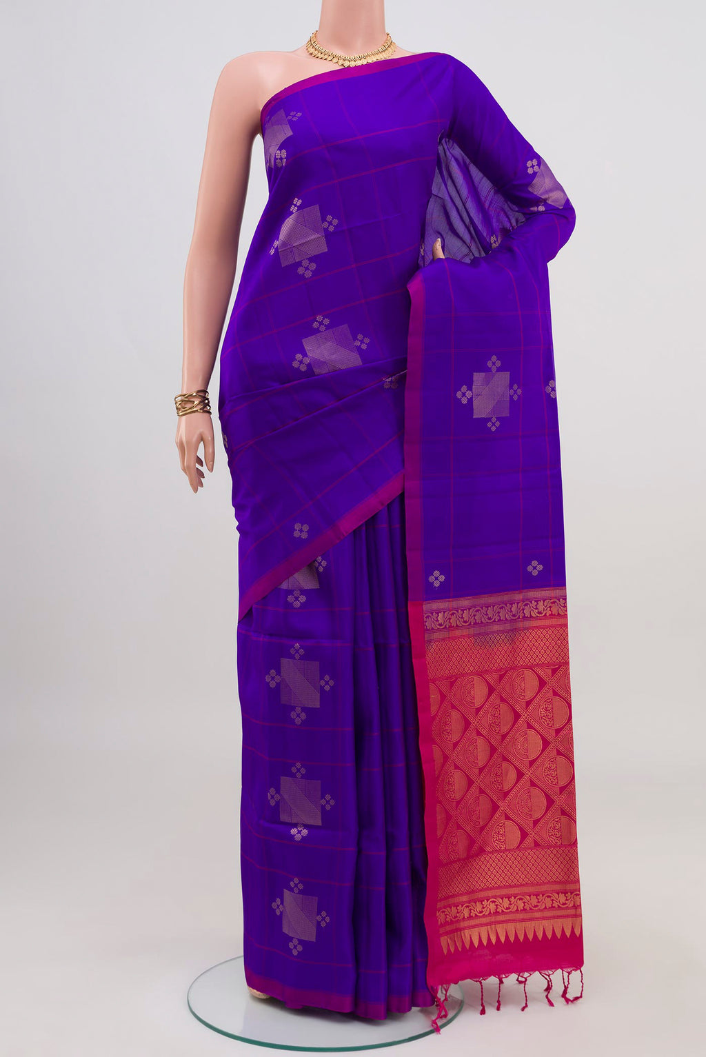 Purple Soft Silk Saree with Zari Butta on the body and Without Border.  displayed on a mannequin