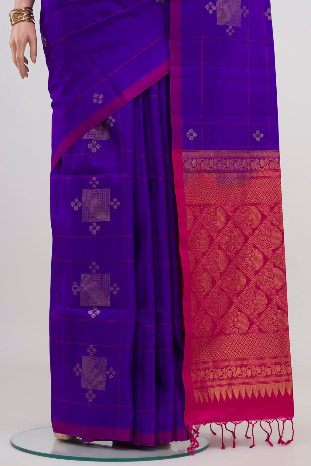 Pleats and pallu of Purple Soft Silk Saree with Zari Butta on the body and Without Border. 