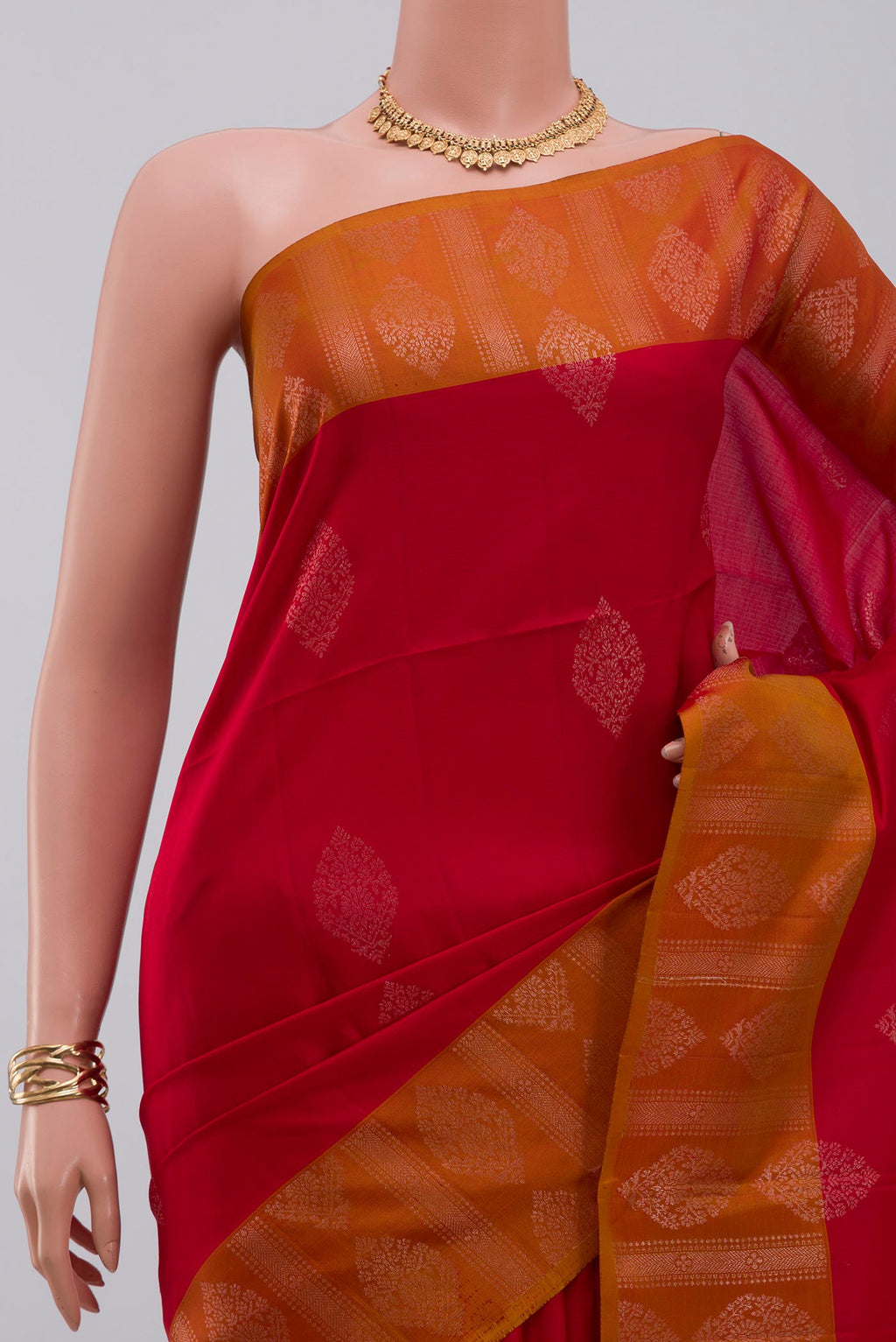Border image of Red Soft Silk Saree with Zari Butta on the body and Fancy Border. 