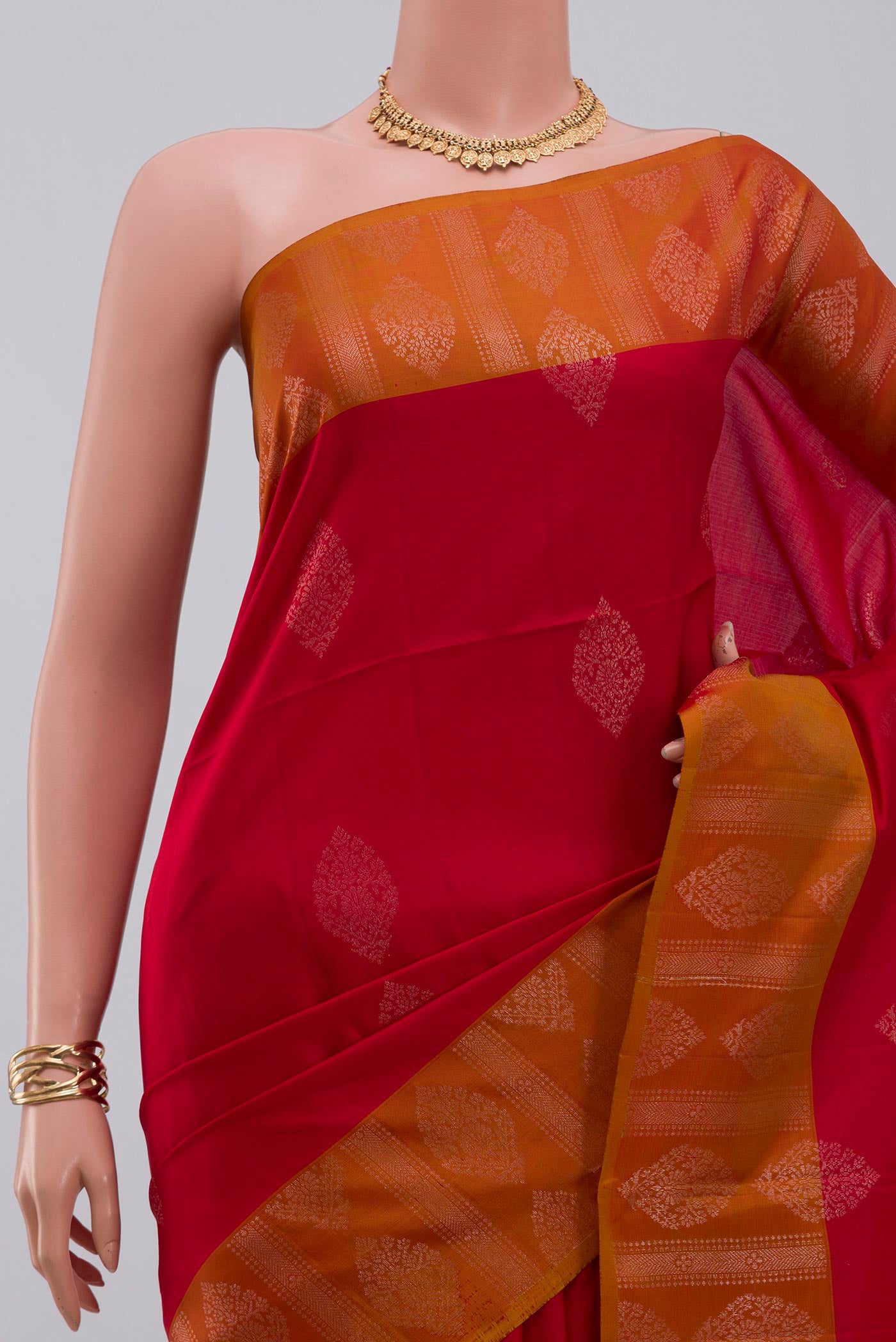 Border image of Red Soft Silk Saree with Zari Butta on the body and Fancy Border. 