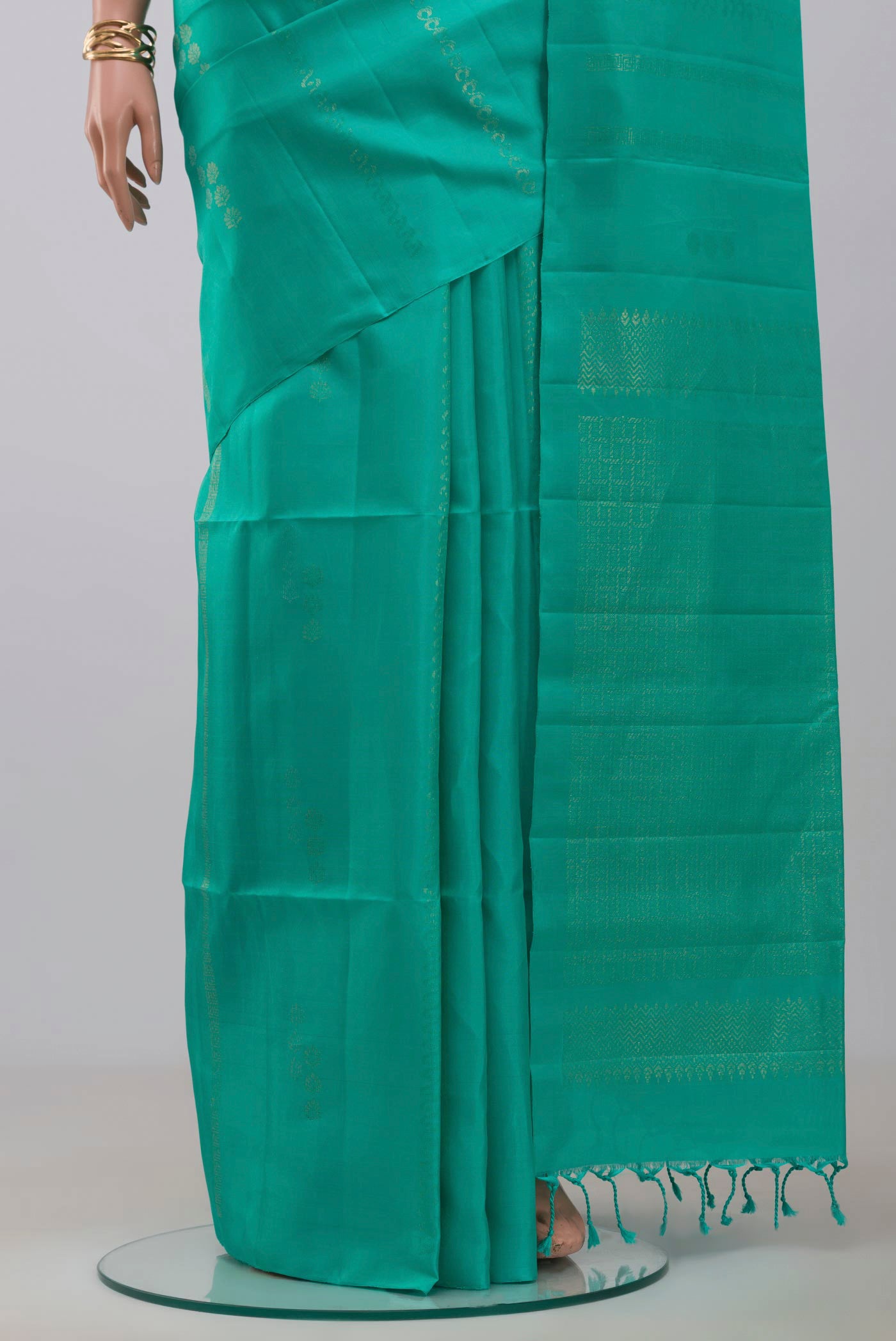 Pleats and pallu of Blue Soft Silk Saree with Fancy on the body and Without Border. 