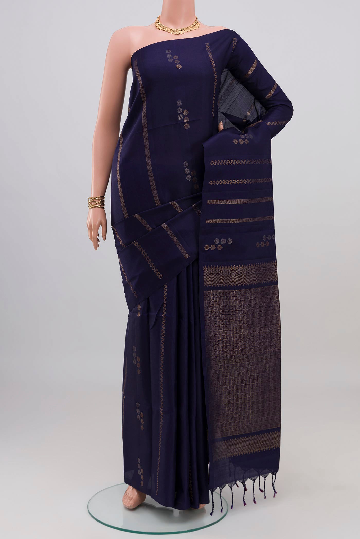 Navy Blue Soft Silk Saree with Stripes on the body and Without Border.  displayed on a mannequin