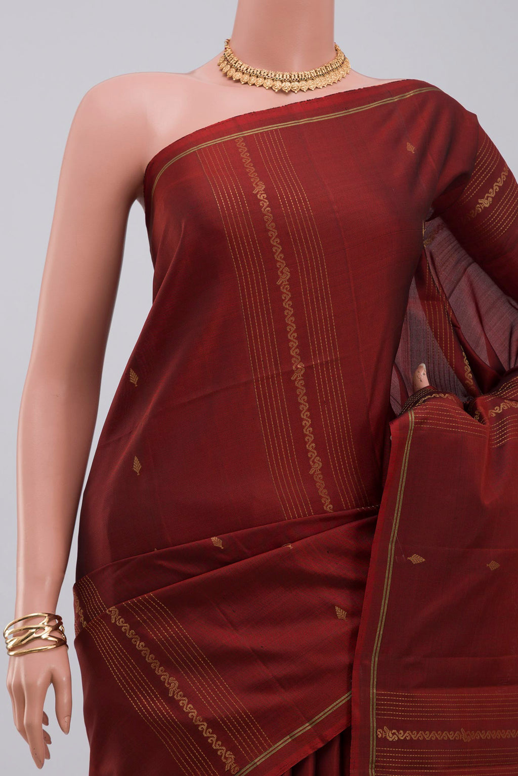 Border image of Maroon Soft Silk Saree with Fancy on the body and Thin Zari Line. 