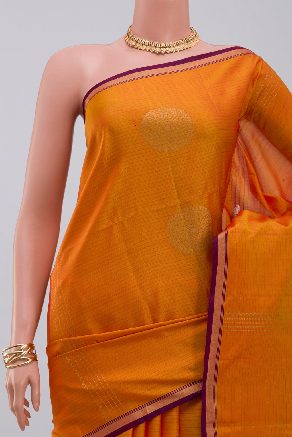 Border image of Yellow Soft Silk Saree with Fancy on the body and Thin Zari Line. 