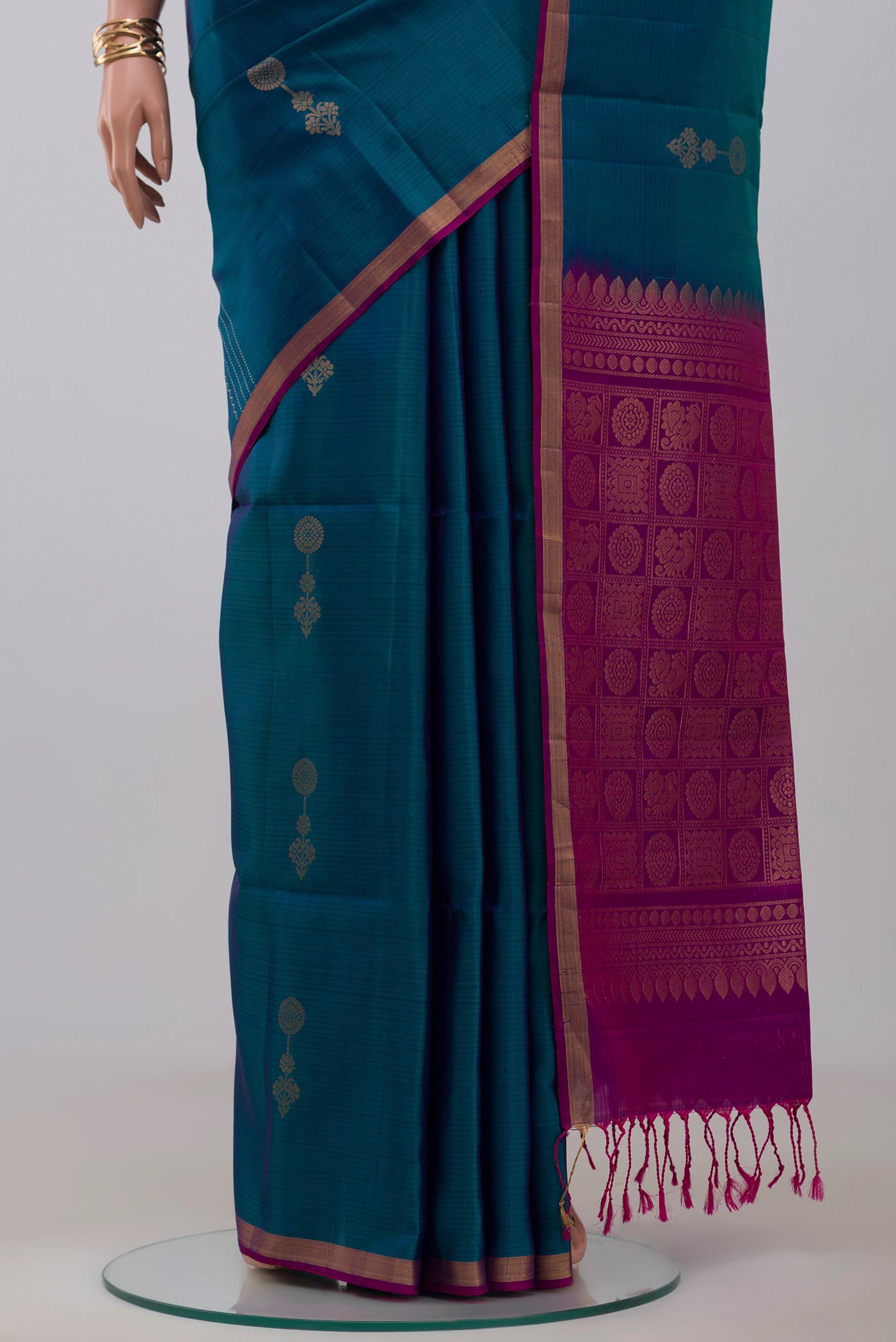 Pleats and pallu of Blue Soft Silk Saree with Fancy on the body and Thin Zari Line. 