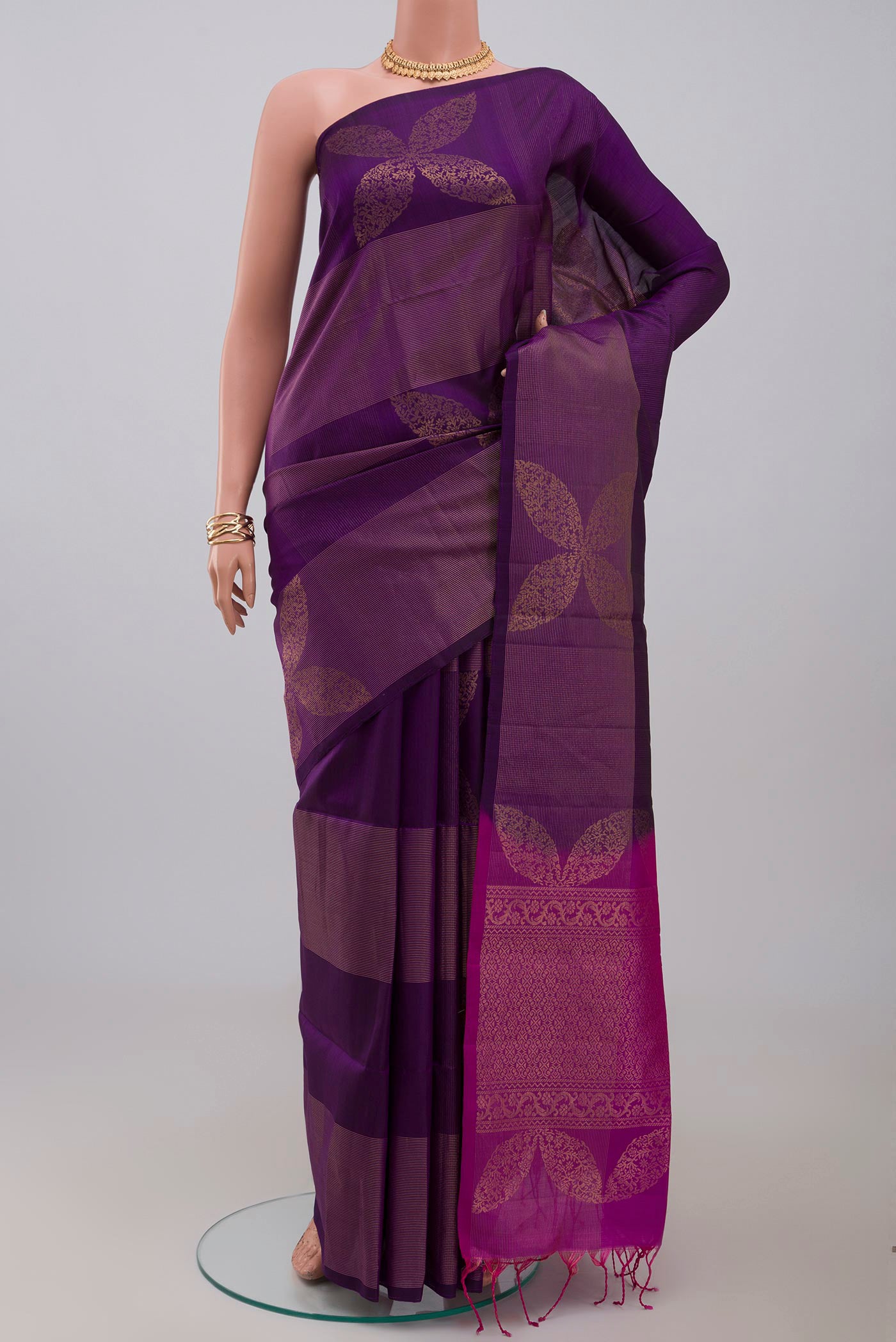 Blue Soft Silk Saree with Fancy on the body and Without Border.  displayed on a mannequin