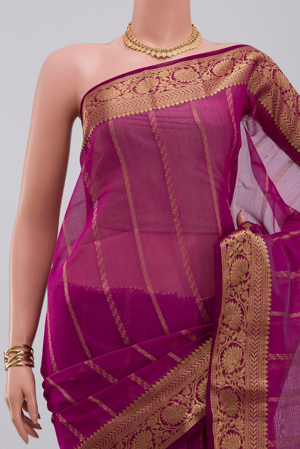 Border image of Purple Silk Cotton Saree with Stripes on the body and Zari Border. 