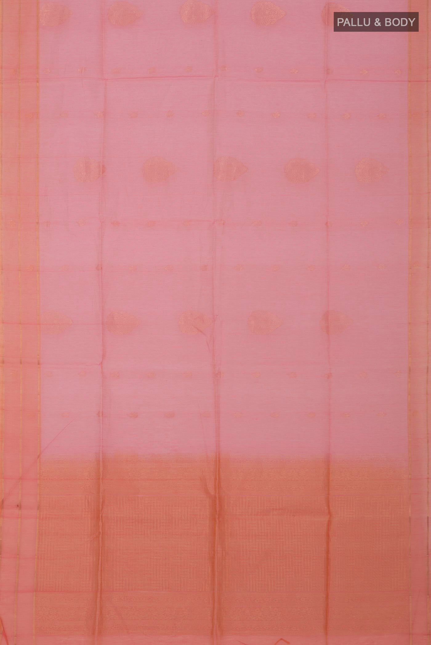 Flat view of Pink Silk Cotton Saree with Zari Butta on the body and Thin Zari Line. 